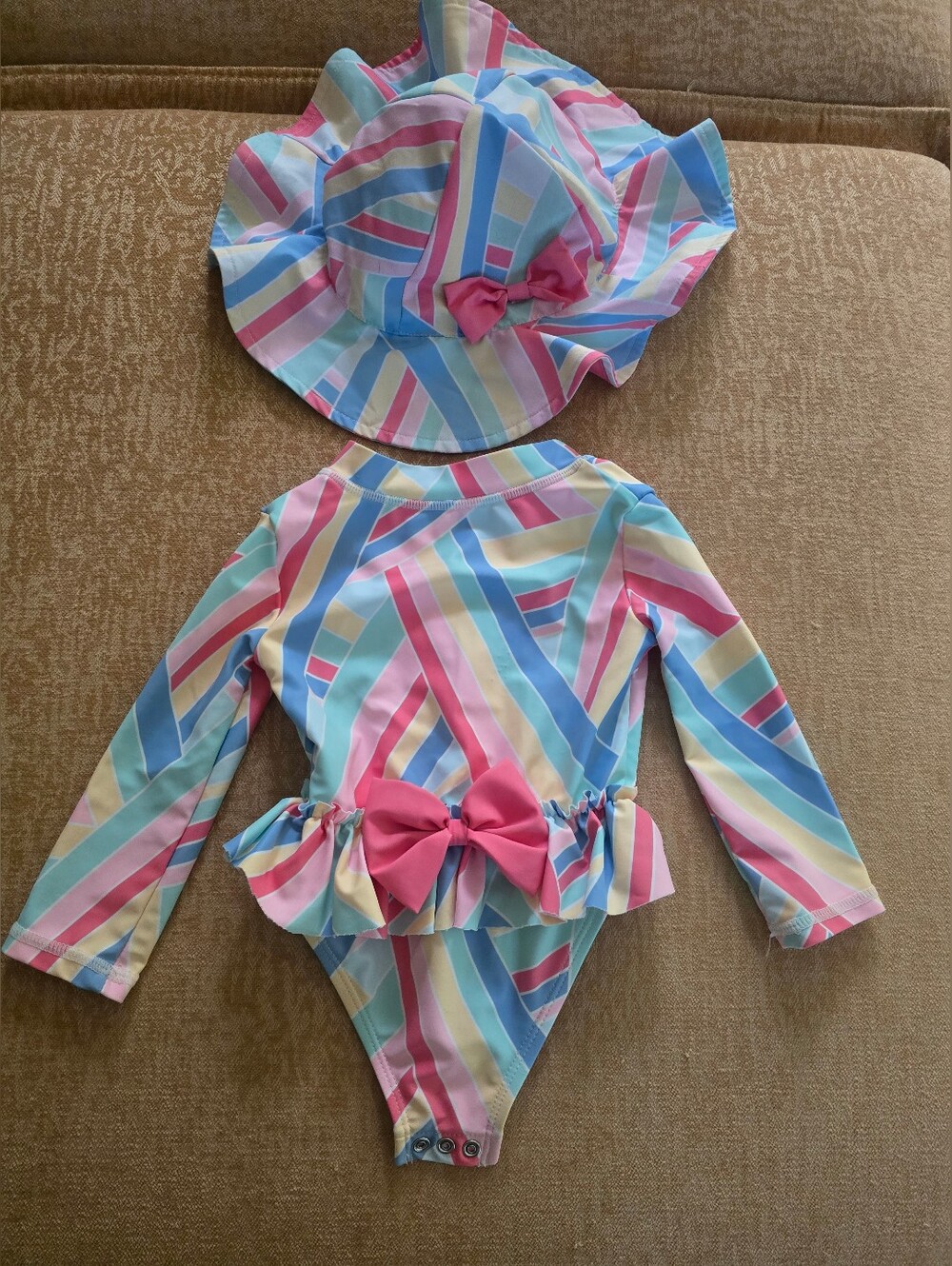 Girls Rainbow Stripe Long Sleeve Swimsuit with Matching Hat and Bow Detail